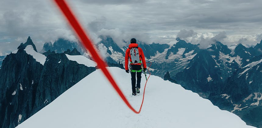 An image of a mountaineer on a snowy ridge