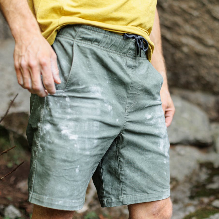 A climber in his chalked up Dirtbag Shorts.