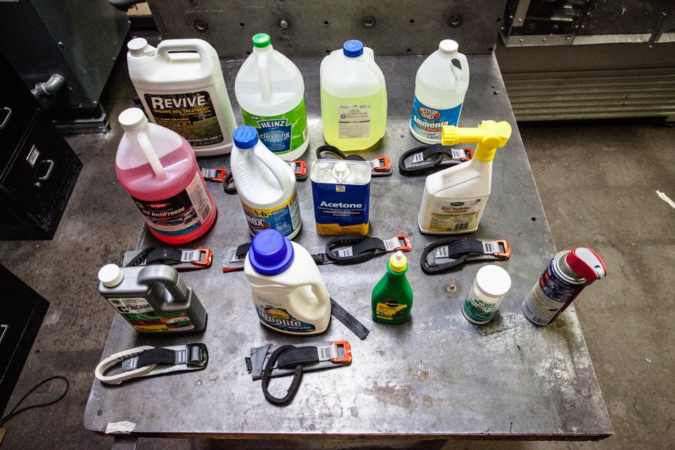 Chemical bottles lined up that were chosen for testing.
