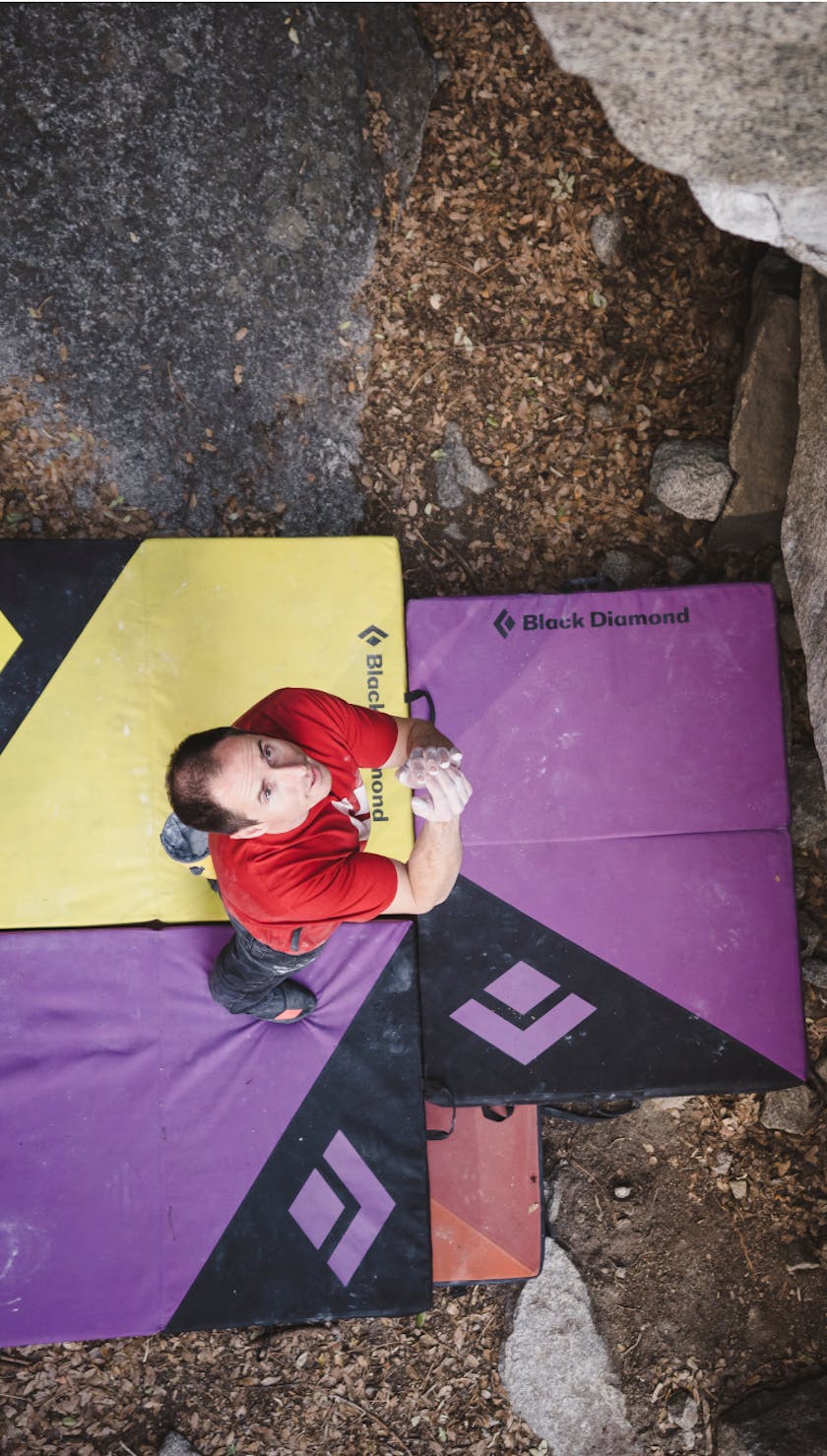 Black Diamond athlete Carlo Traversi and friends laying on Circuit Crash Pads.