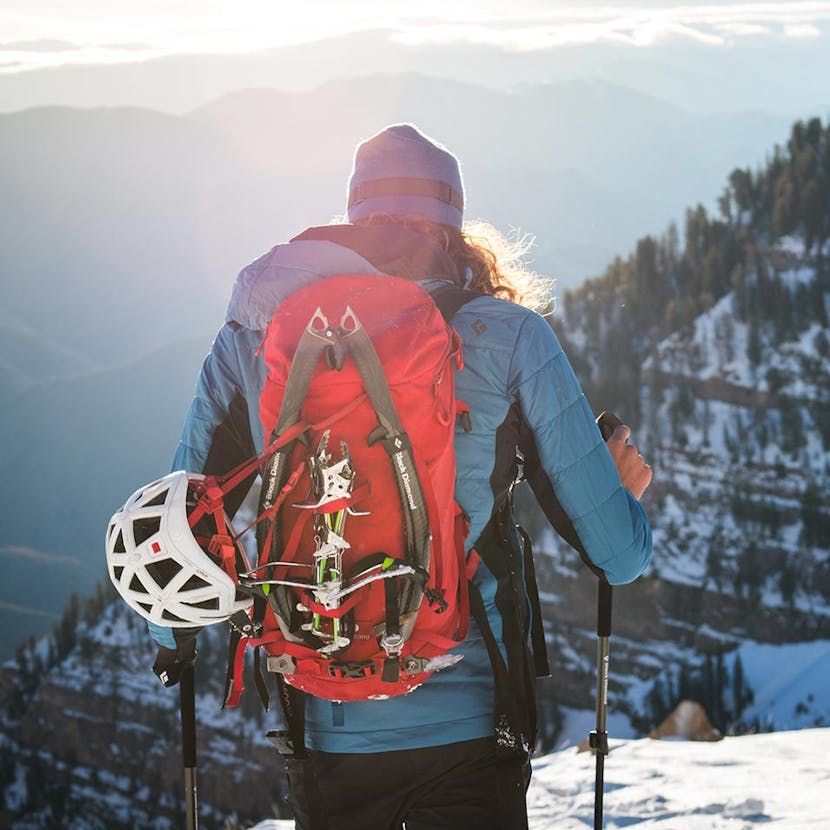 man making his way along a ridge