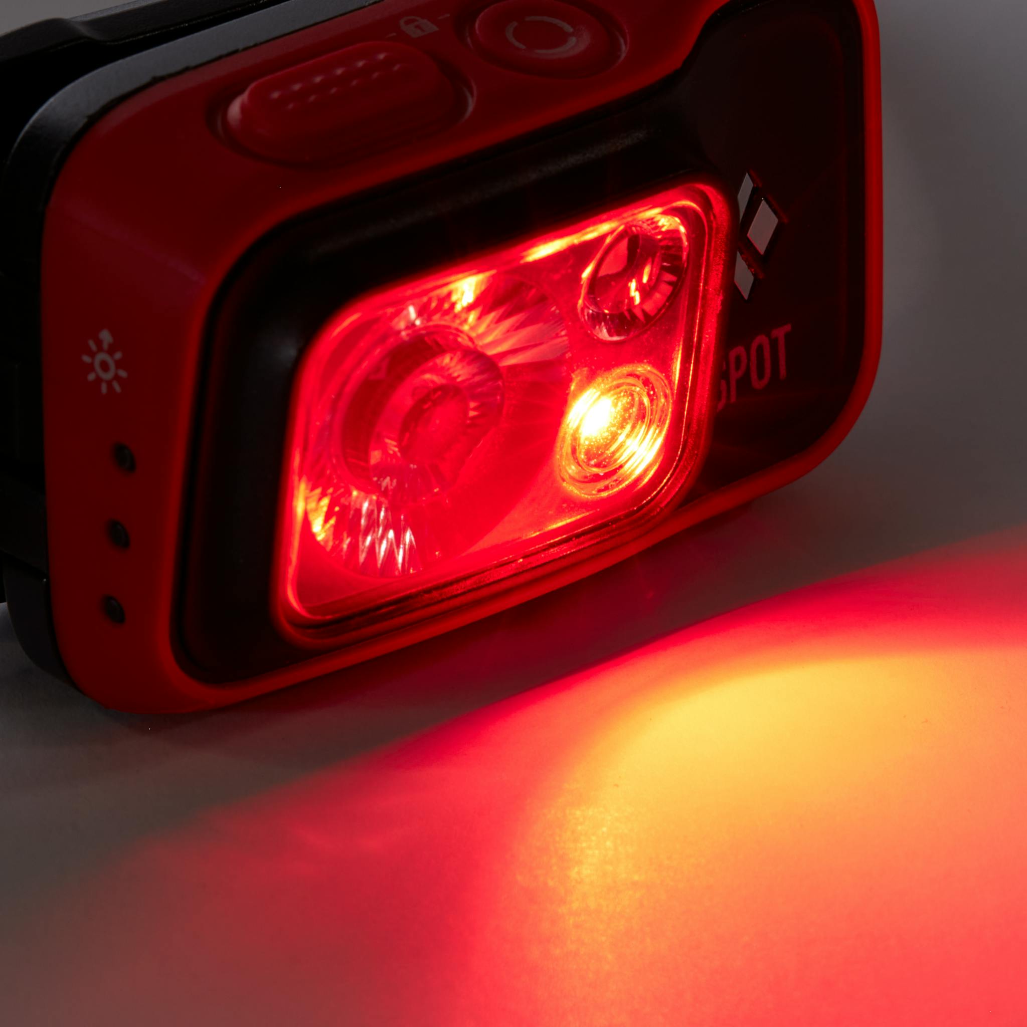A picture of the Spot 400 headlamp illuminating the red LED.