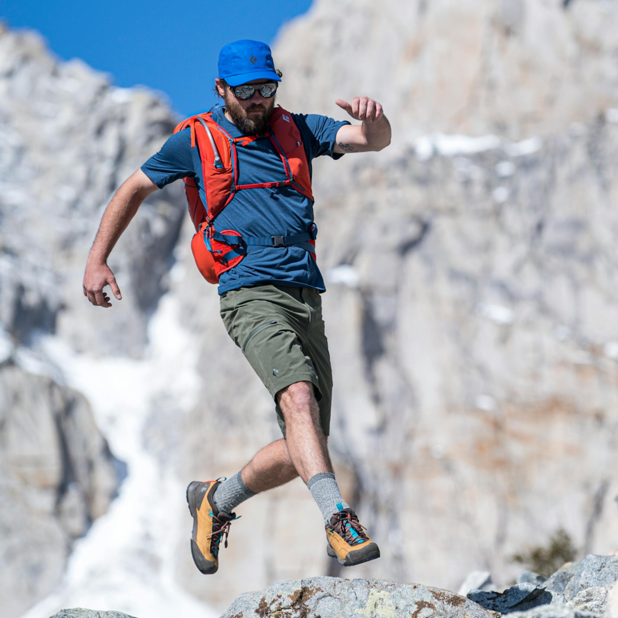 A hiker wearing the Black Diamond Lightwire Tech Tee.
