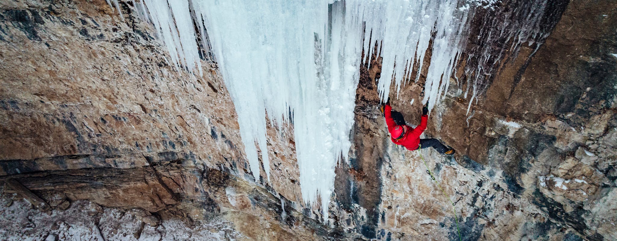 Black Diamond Athlete Aaron Mulkey climbing ice in Wyoming. 