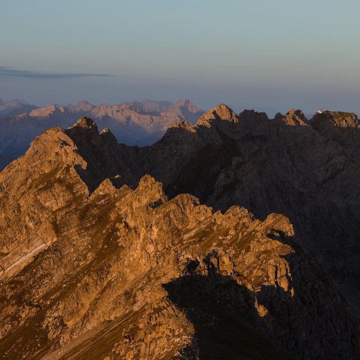 Mountain range in the Austrian alps at sunset