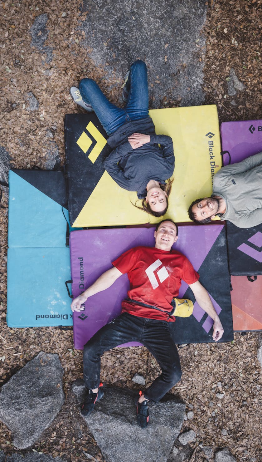 A Group of people laying on Circuit Crash Pad