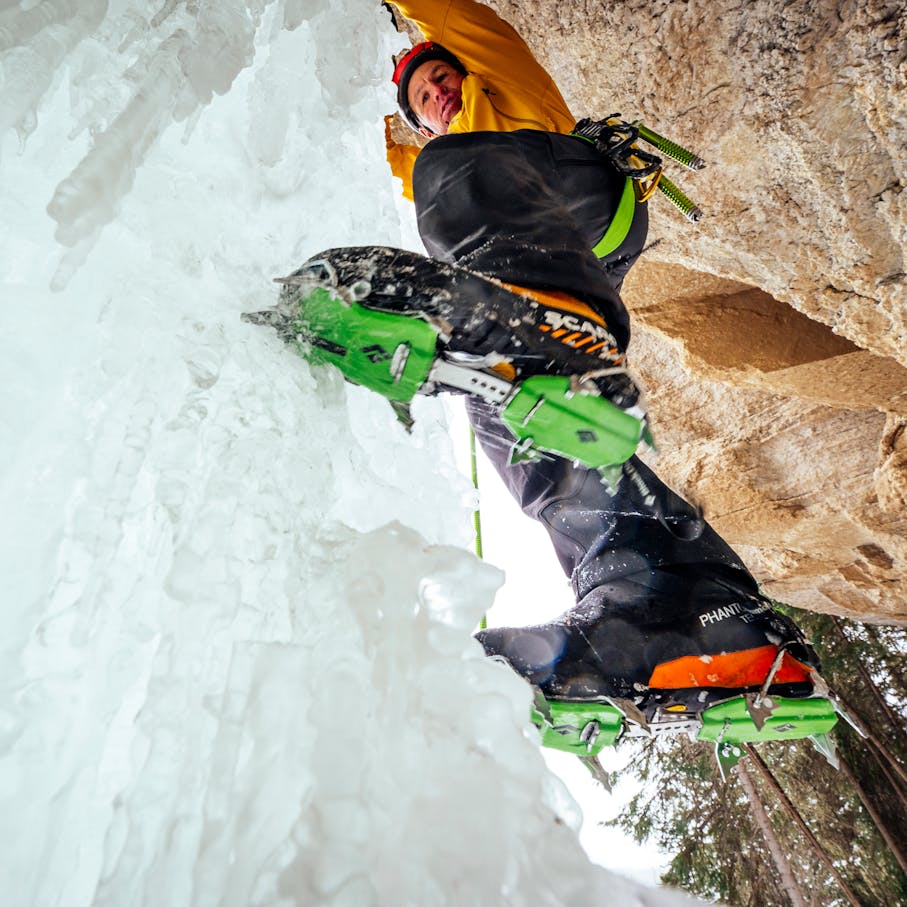 BD Athlete Aaron Mulkey swings his crampons into the ice.