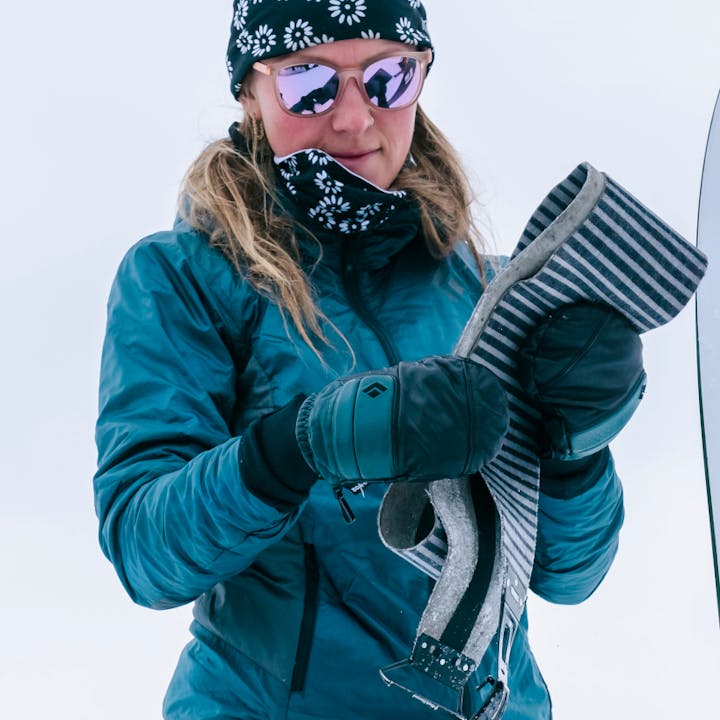 Black Diamond Athlete Mary McIntyre packing up her skins on a backcountry tour | gloves for women