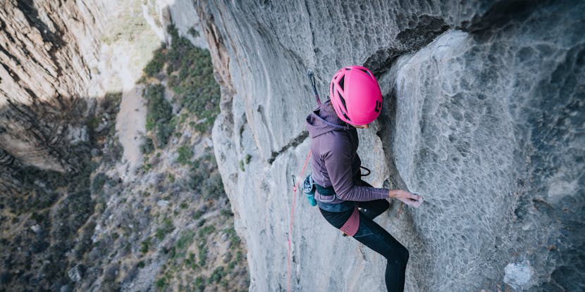 A climber wears the Black Diamond Coefficient hoody while climbing in AZ.
