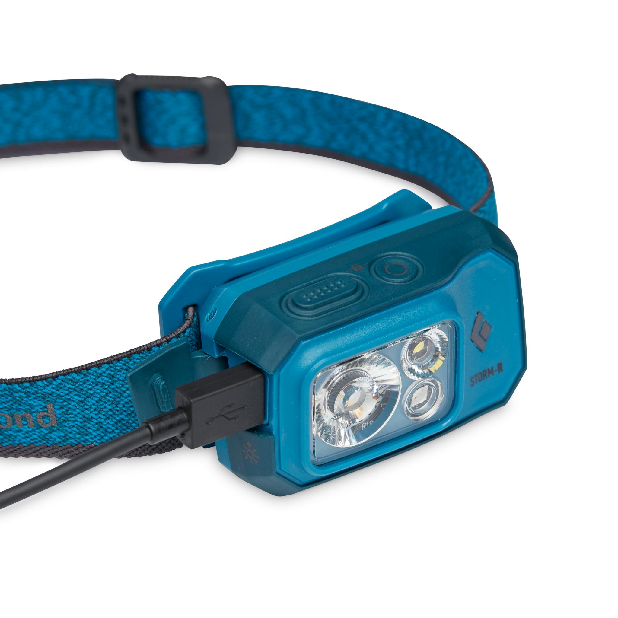 The blue Storm 500 R rechargeable headlamp with a micro USB charger.