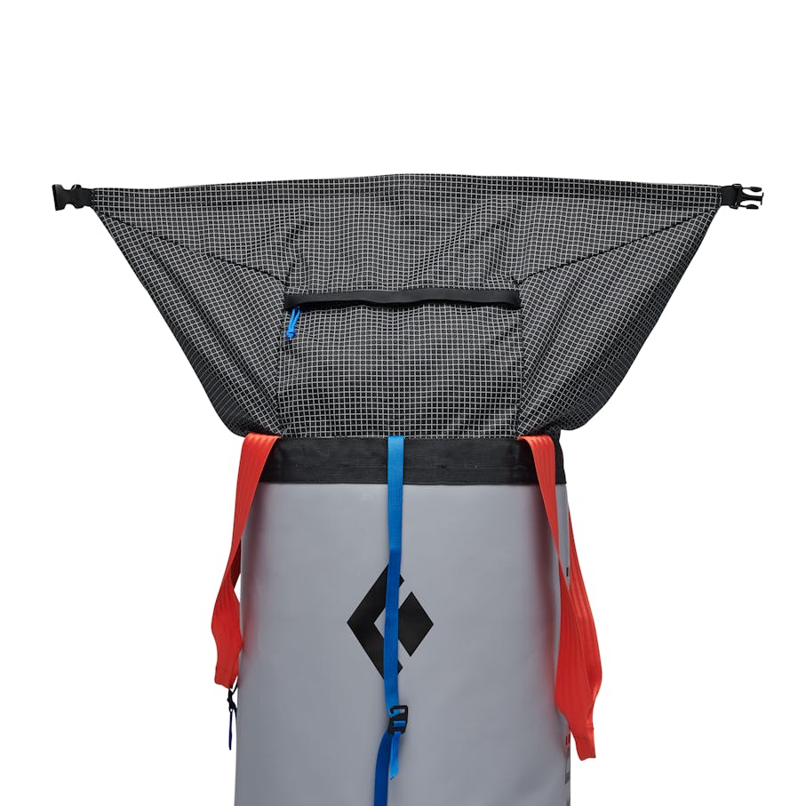 Roll-top closure with extra stash pocket.