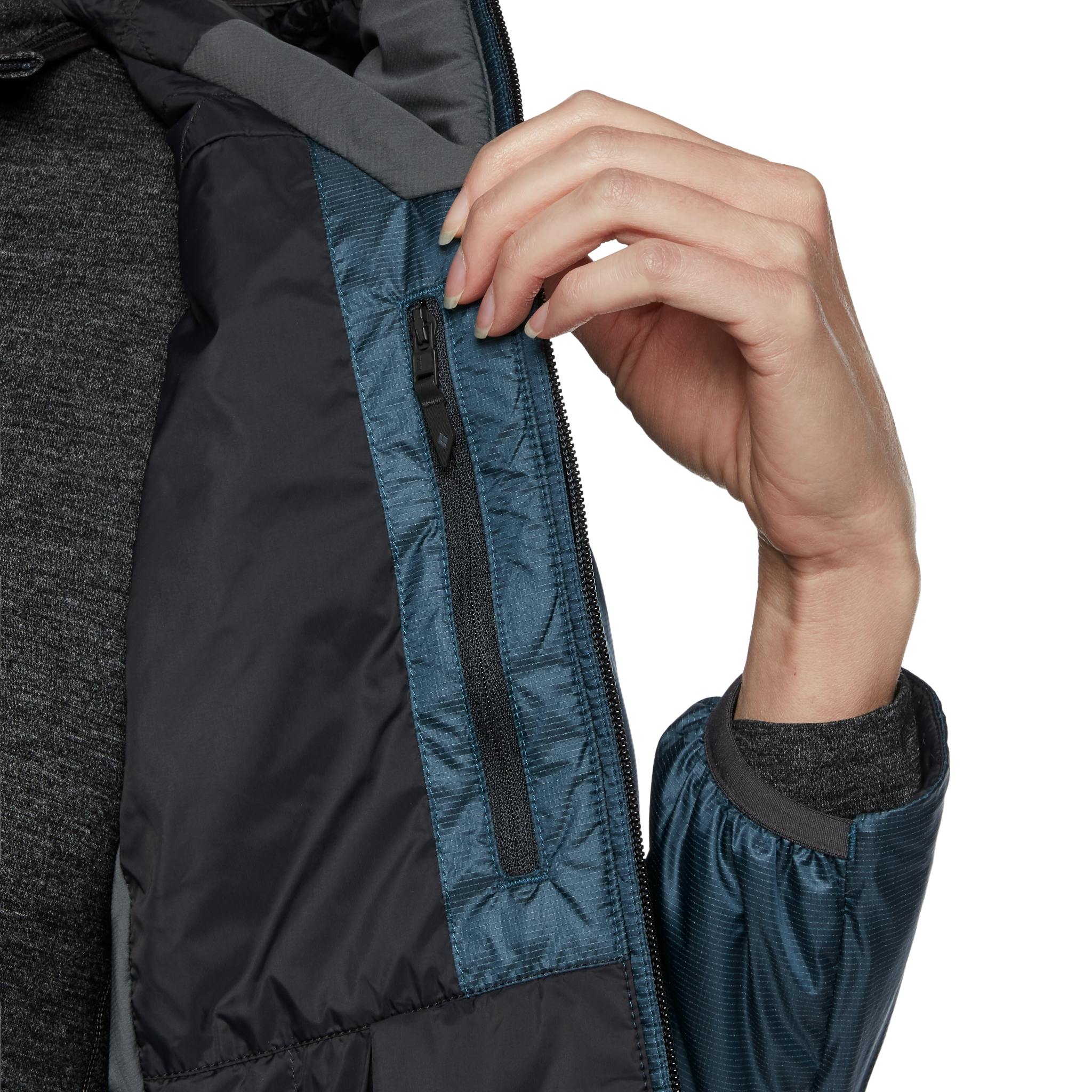 A close up image of the inside zippered pocket on a Women's Vision Hybrid Hoody.