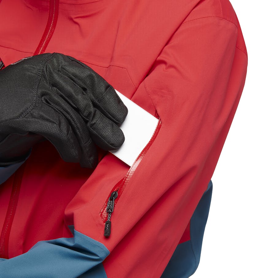 Zippered pocked on sleeve for ski pass.