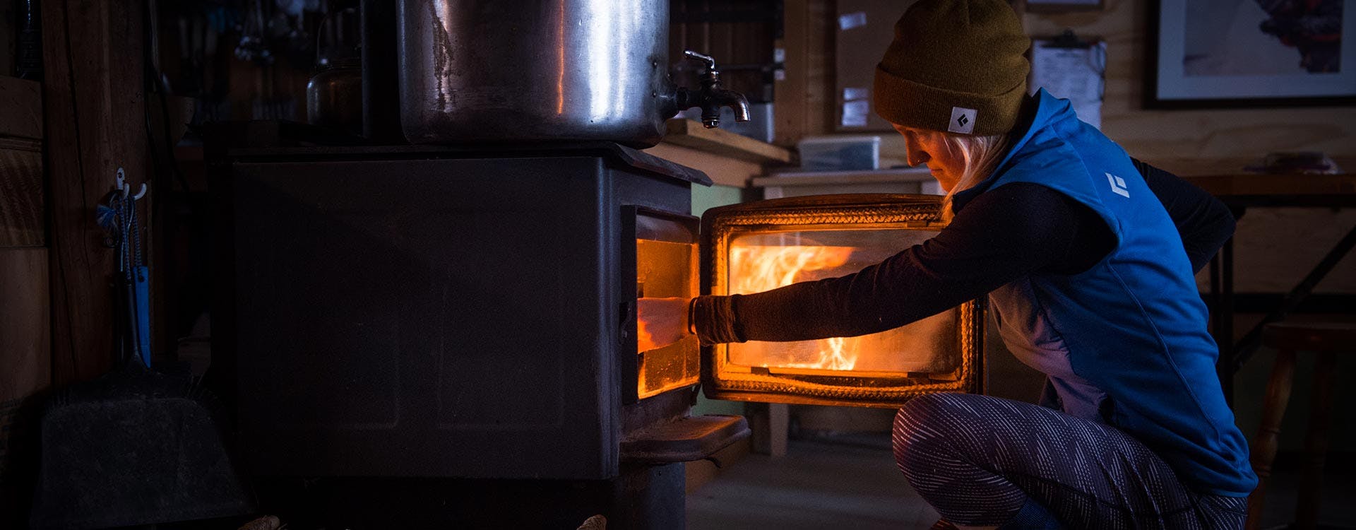 Mary Mac stoking the fire