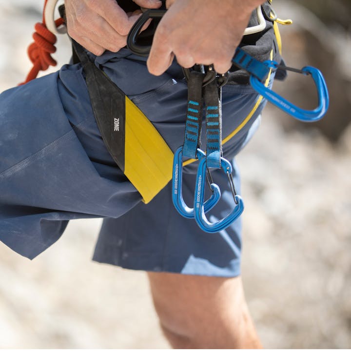 Photograph by Andrew Burr of climber with Black Diamond quickdraws on harness