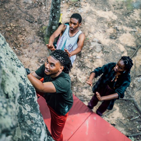 HBCUs Outside bouldering with Black Diamond Bouldering Pads. 