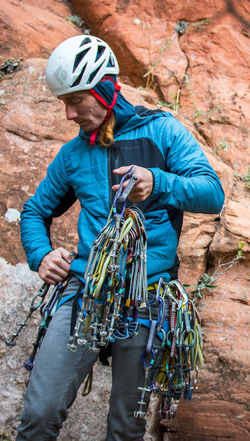 Photograph by Andy Earl of Big Wall Paul with rock climbing gear.