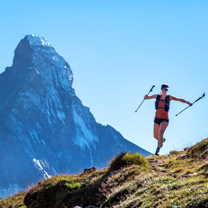 Black Diamond Athlete Hillary Gerardi running in the Alps. 