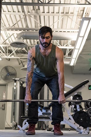 Sam Elias performing a bent over row
