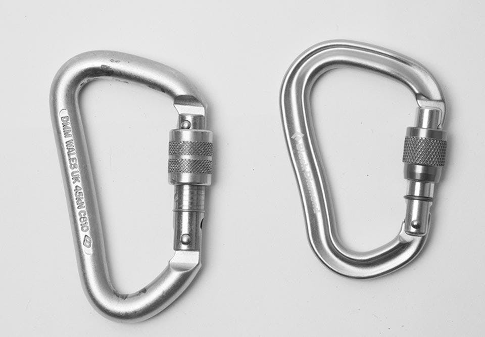 side-by-side comparison of two carabiners