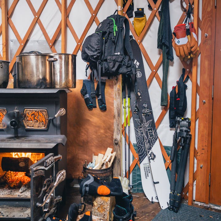 Snowboard gear that was brought inside a Backcountry Yurt to dry out. 
