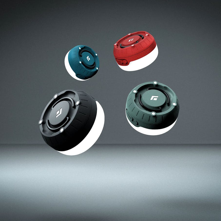 Glam shot of four Moji + lanterns in all available colors on a grey background