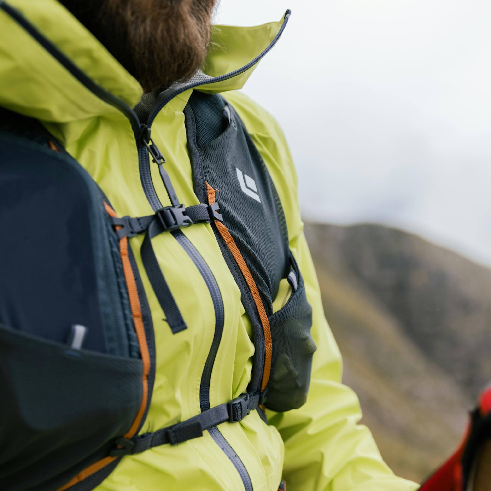 A close up of a hiker in a Pursuit Backpack