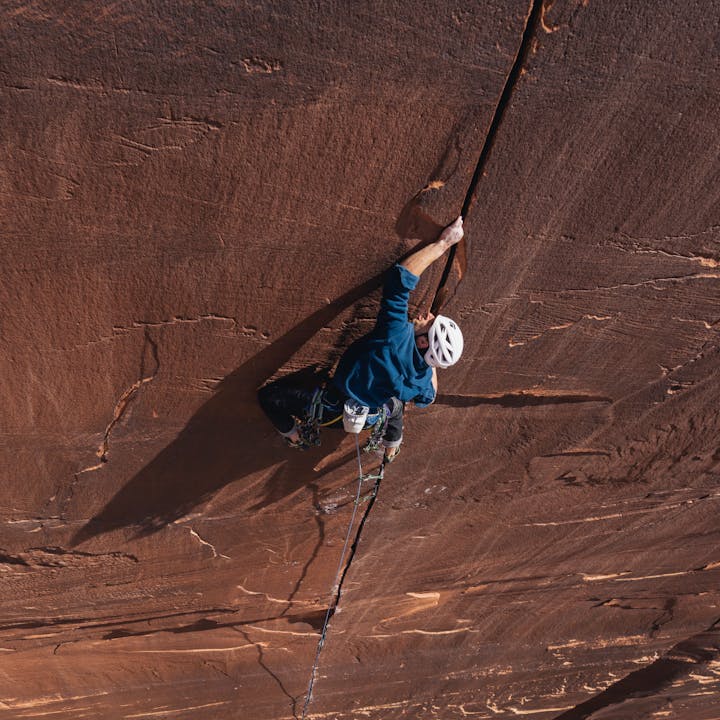 Black Diamond athlete Connor Herson on the sharp end climbing in Indian creek Utah.  