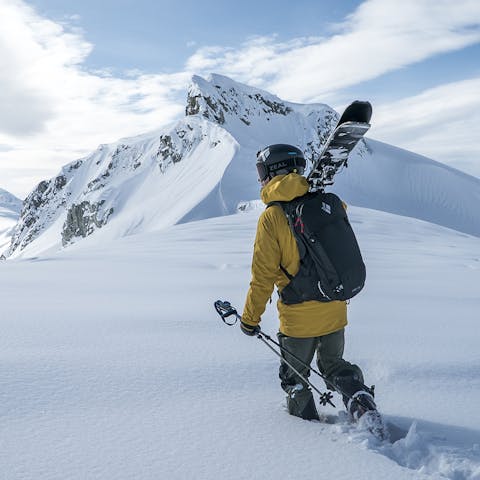Black Diamond Athlete Tobin Seagel looking at a line in British Columbia, Canada.