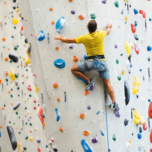 A climber wears Black Diamond performance apparel to get the most out of their session.