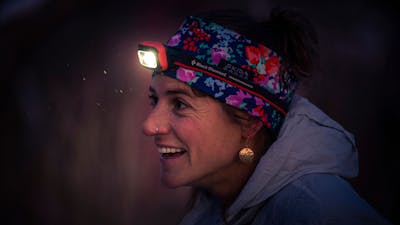Woman wearing a headlamp