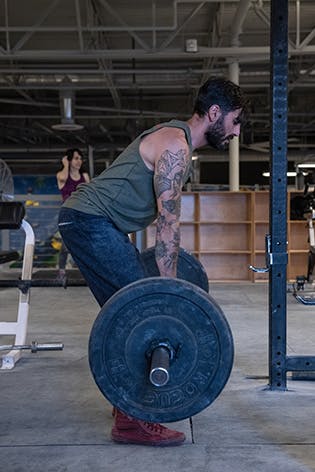 Sam Elias performing a bent over row