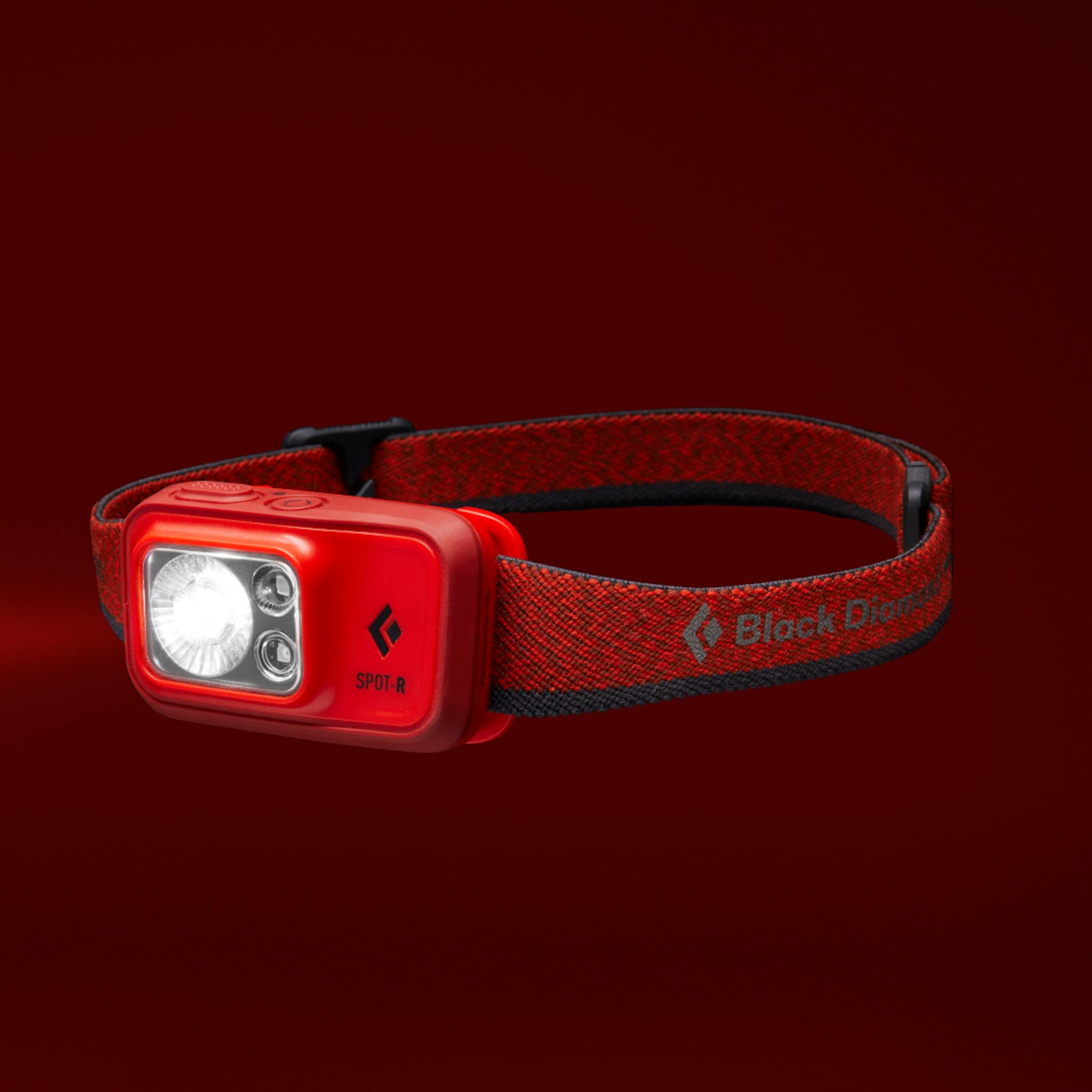 A red Spot 400 R Headlamp.