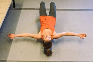 arms in T position
