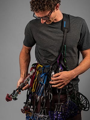 Photograph by Andy Earl of Tyler Willcutt holding his prototype gear sling.