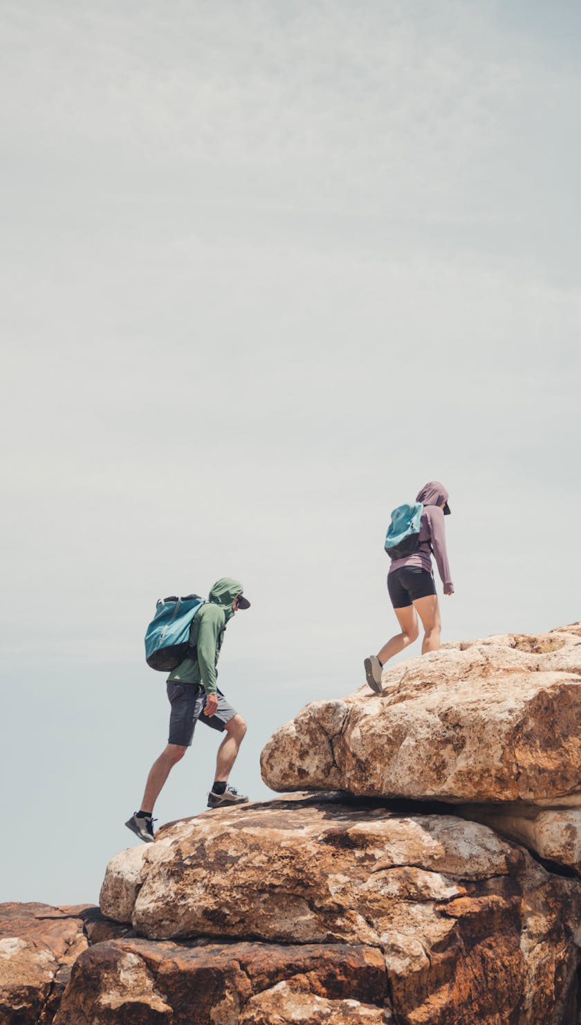 Two climbers approaching a climbing route in Black Diamond climbing gear | Approach Shoes | Approach Apparel