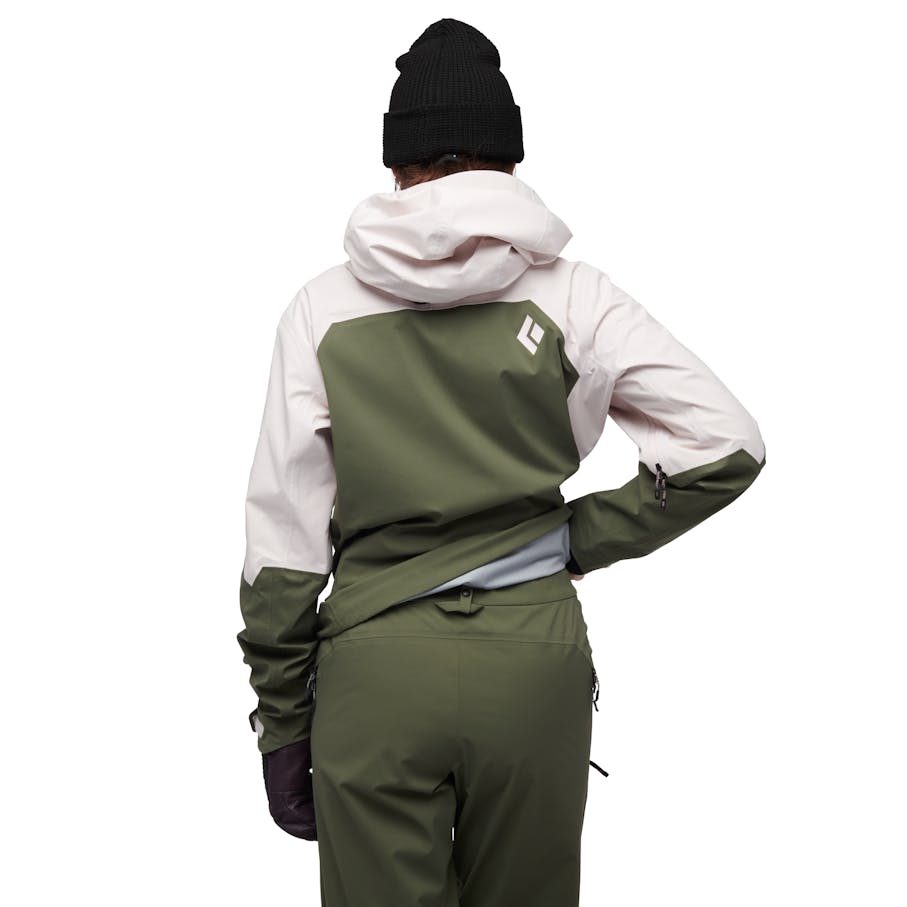 Interior center back snap tab for attachment/ interface to pant.