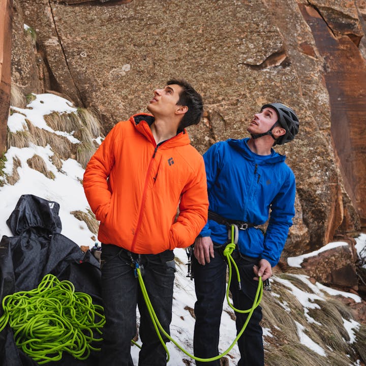 Black Diamond athletes Connor Herson and Carlo Traversi inspect a climb in Indian Creek UT.  