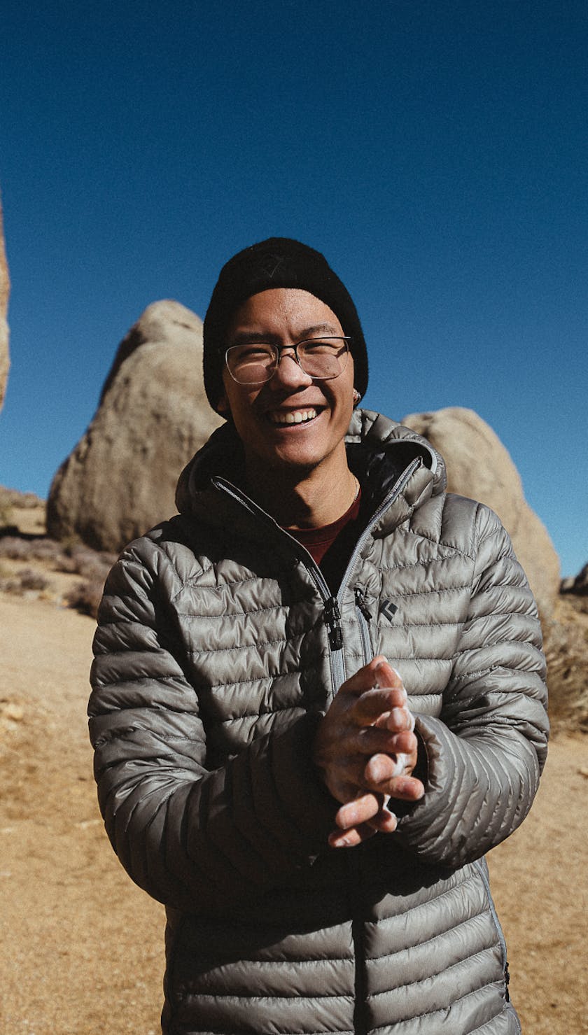 Black Diamond athlete Timmy Kang wearing the Approach down hoody.