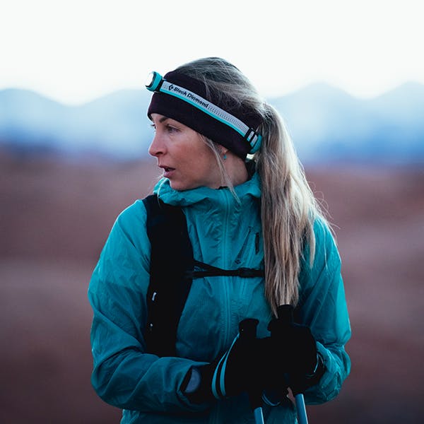 Black Diamond Athlete Kelly Halpin posing for a photo while running.