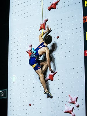 Adam Ondra in the middle of the route