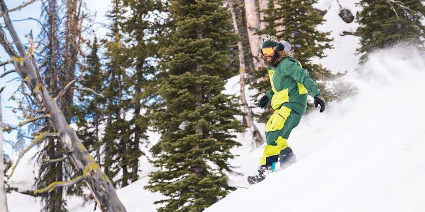Black Diamond athlete John Jackson skiing low angle powder in his signature edition Recon Pro Shell and Bibs.