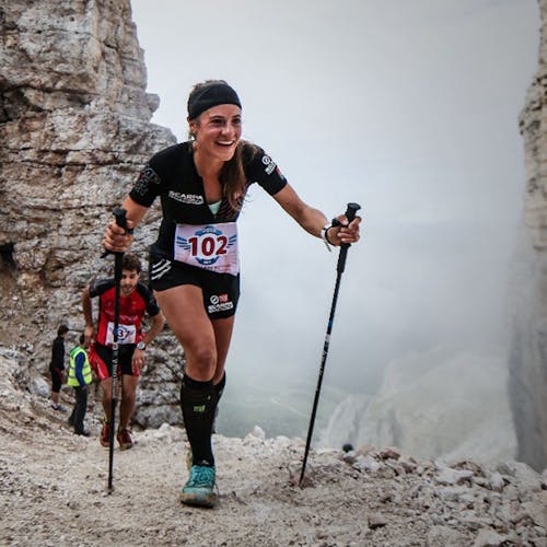 Hillary trekking up mountain
