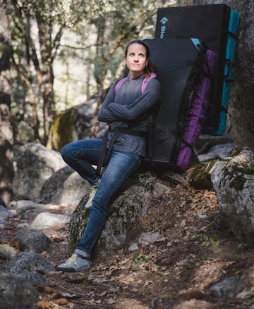Friend of Black Dimond wearing the Forged Denim pants out for an after work bouldering session with their Circuit crash pads.