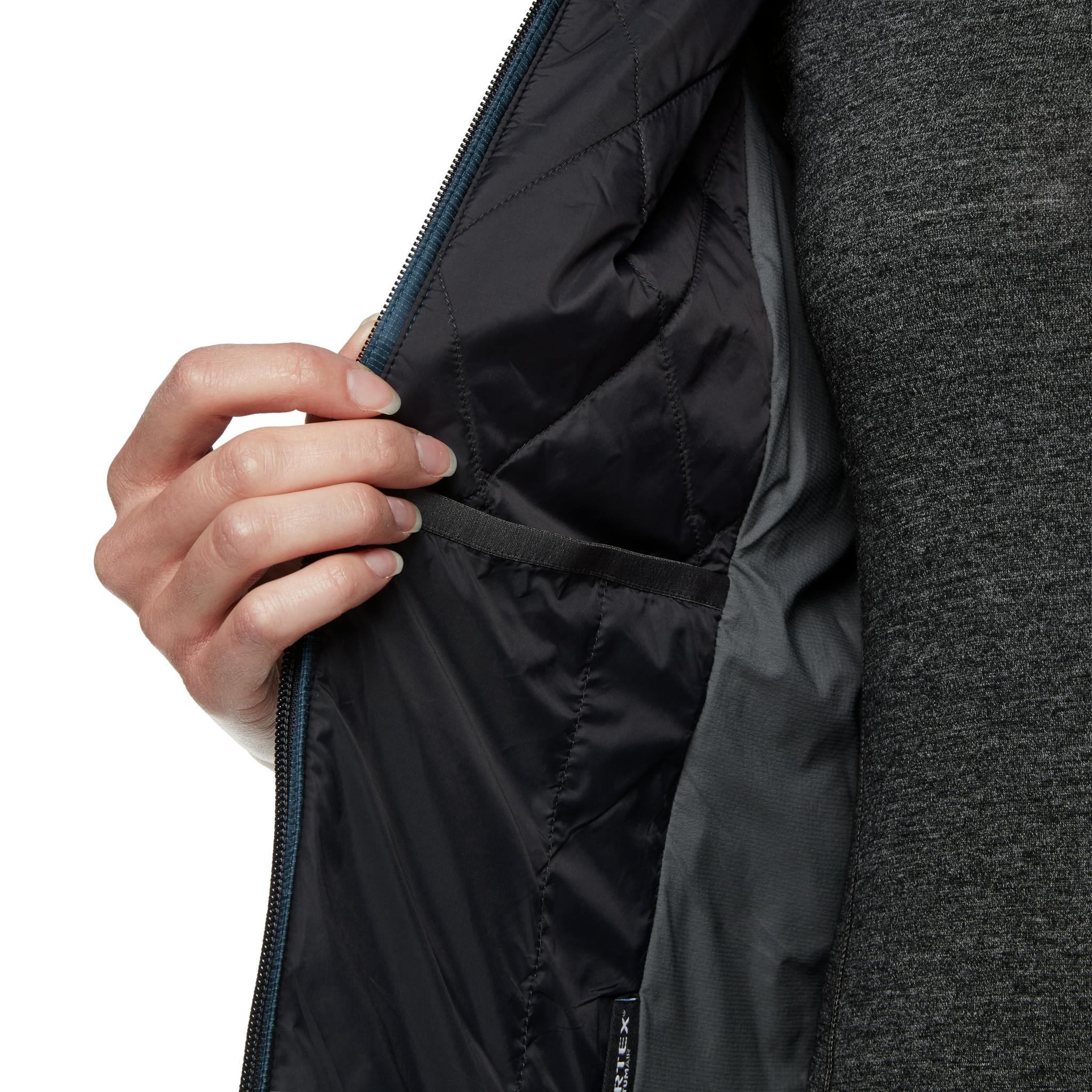 A close up image of the inside pocket on a Women's Vision Hybrid Hoody.
