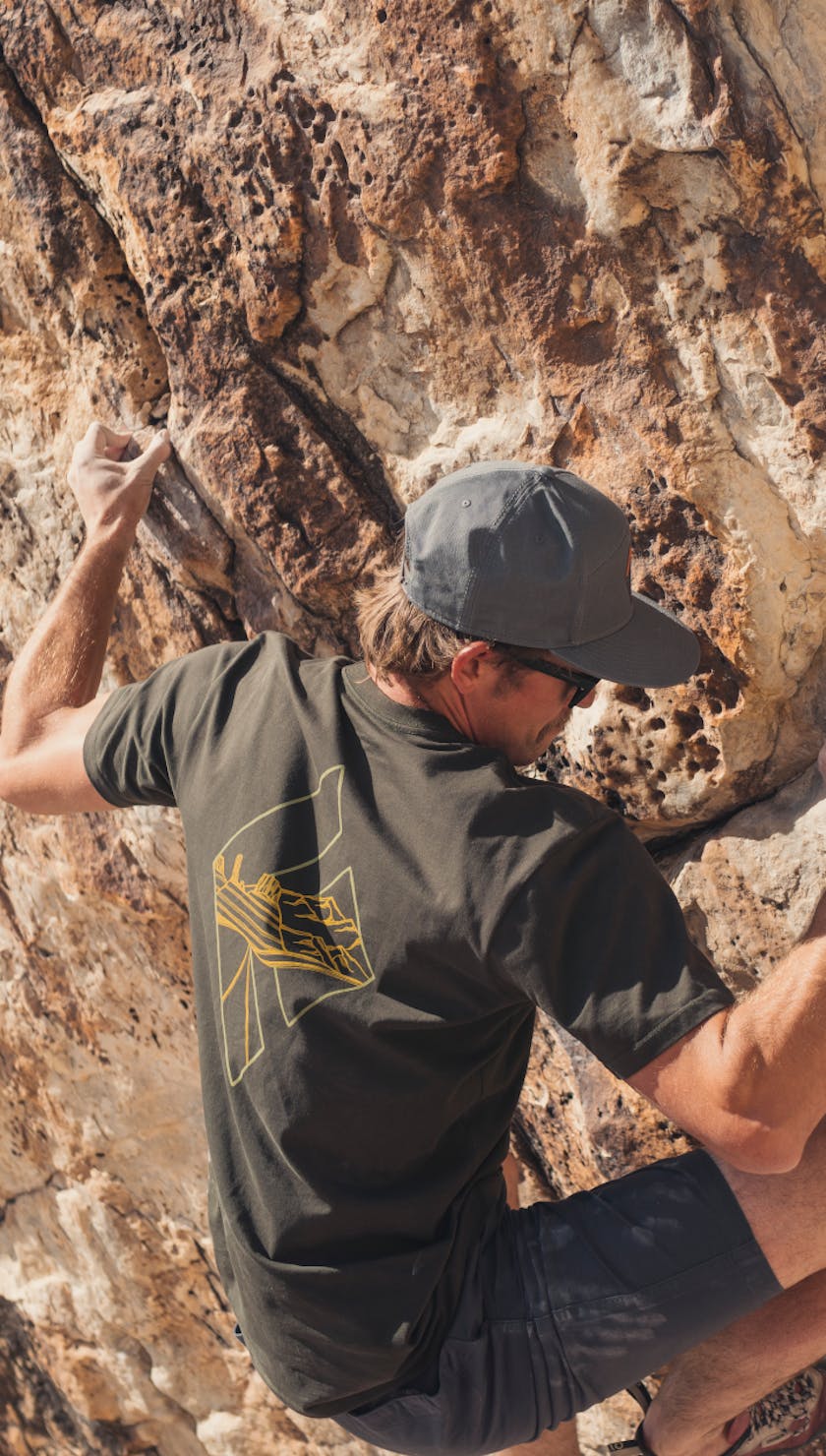 Climber wearing the Black Diamond Desert to Mountains T-Shirt.  