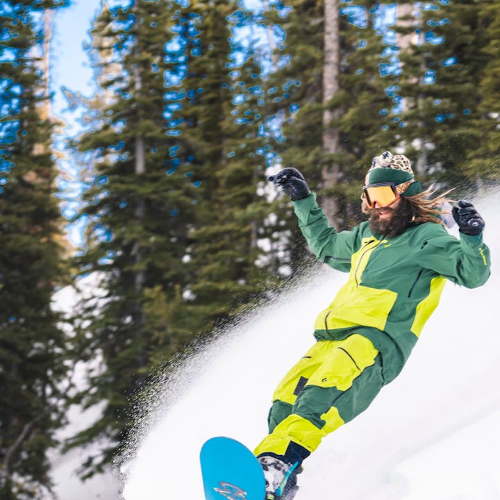 BD athlete Eric Jackson butters down some spring powder wearing a Black Diamond Pro Recon Shell and Bib. 