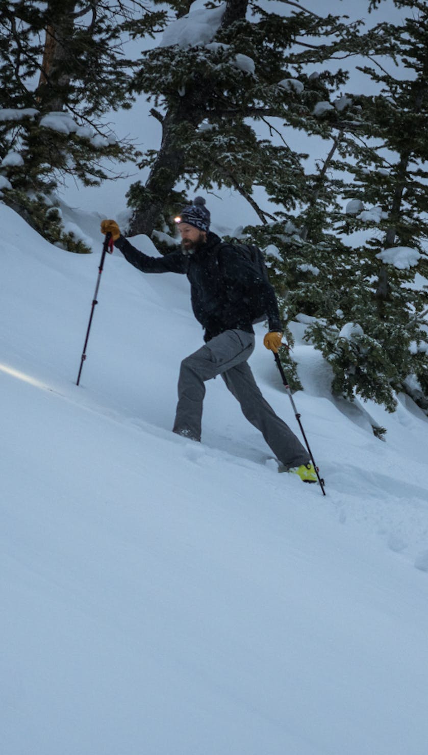 A backcountry skier wears the Black Diamond Coefficient Fleece while out on a dawn patrol. 