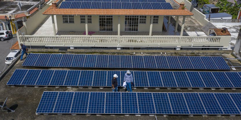 Solar panels being installed by the Honnold Foundation crew. Photo by Ricardo Arduengo