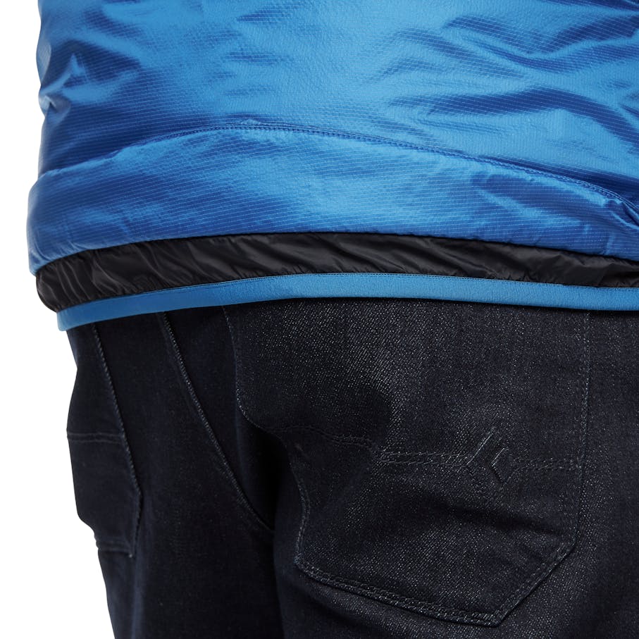 A close up of the back lower hem of the Vision Hybrid Hoody.